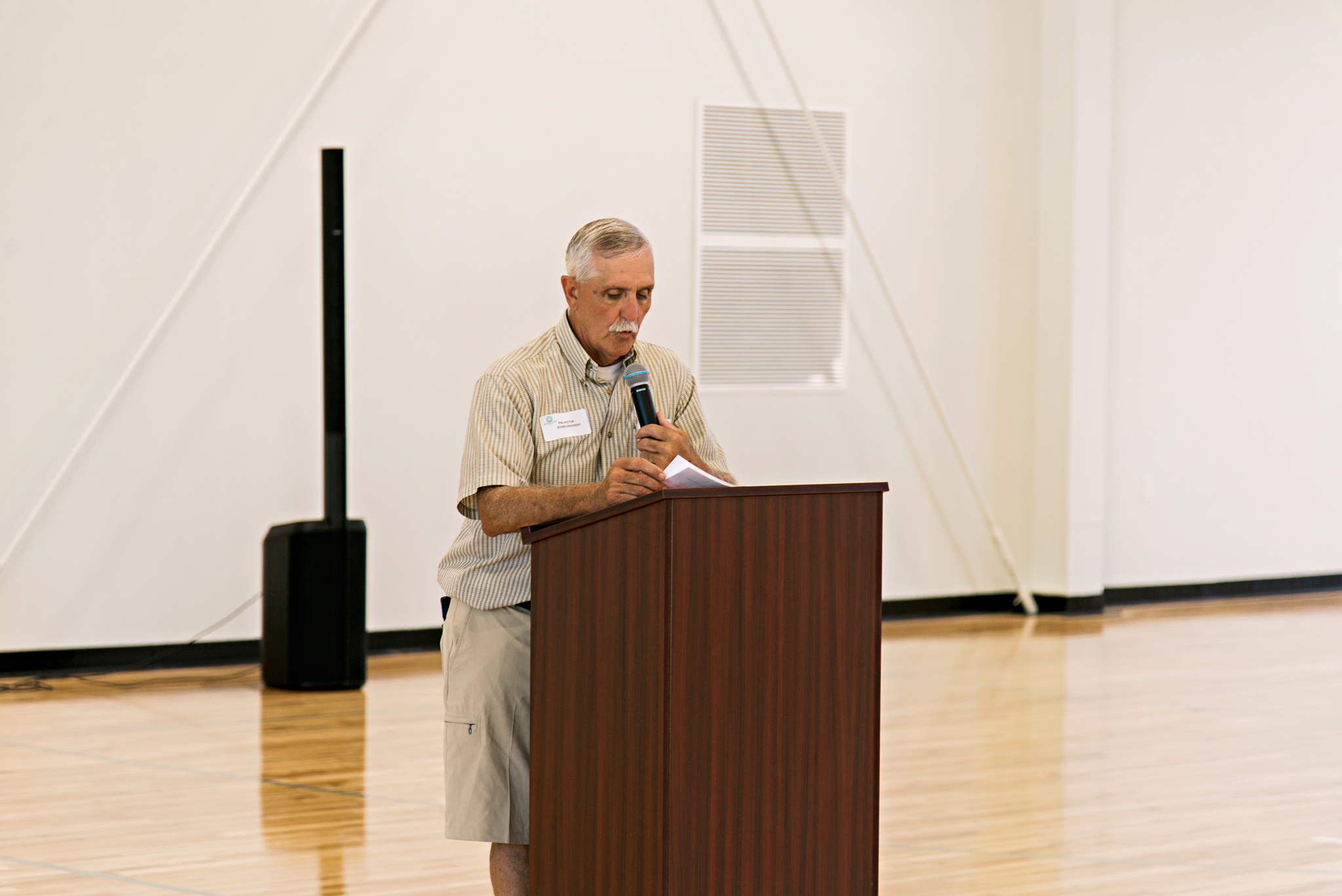 ACCOA Board President Phil Potter welcomes the crowd to the brand new Sunrise Center